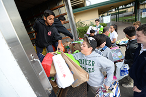 Middle school students helping out at Family Giving Tree event