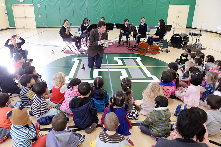 Middle school musicians perform at preschool