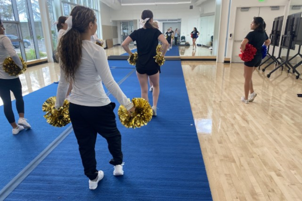 Olivia Long '18 Drops in to Coach Cheer Squad