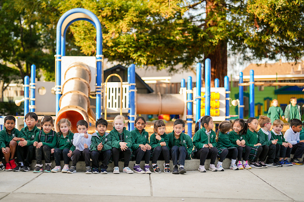 kindergartners sitting in a row