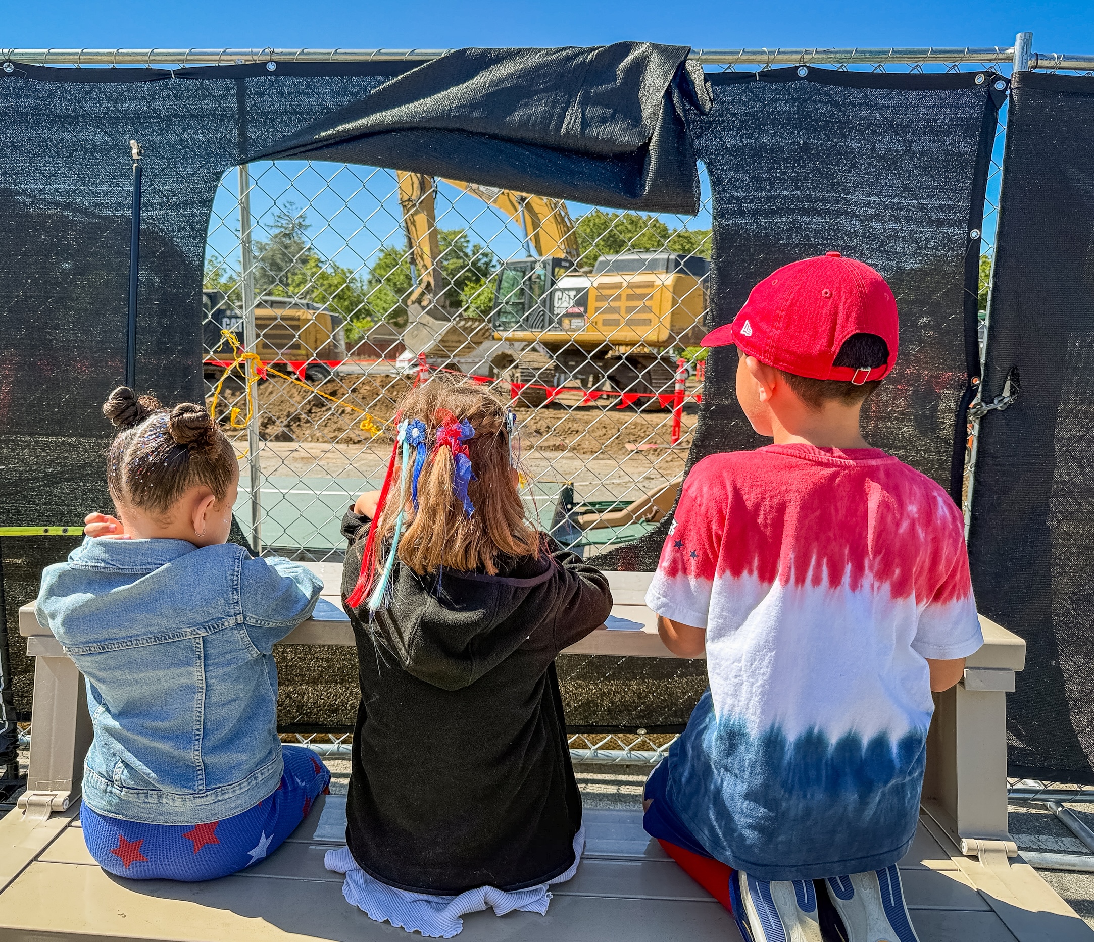 children watching construction